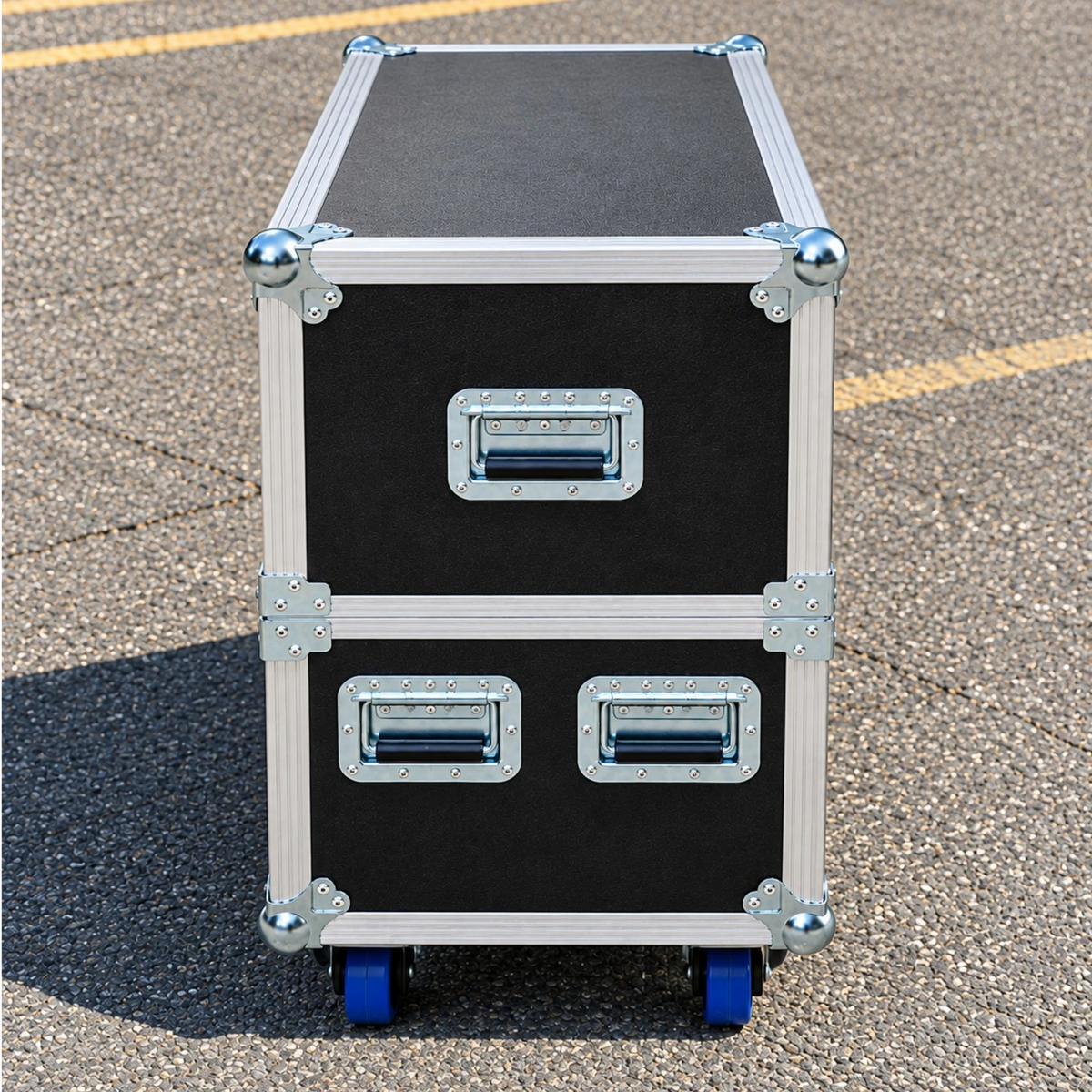 lack multi-screen TV ATA case, closed side view showing three recessed spring handles, ball corners, and blue casters