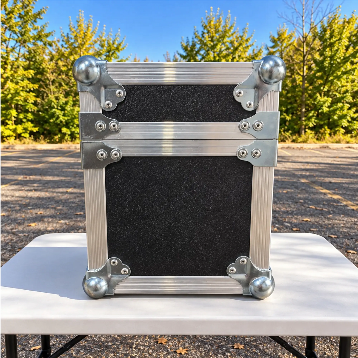 Black 6 microphone ATA case, closed side view showing solid rear panel construction and protective corner hardware