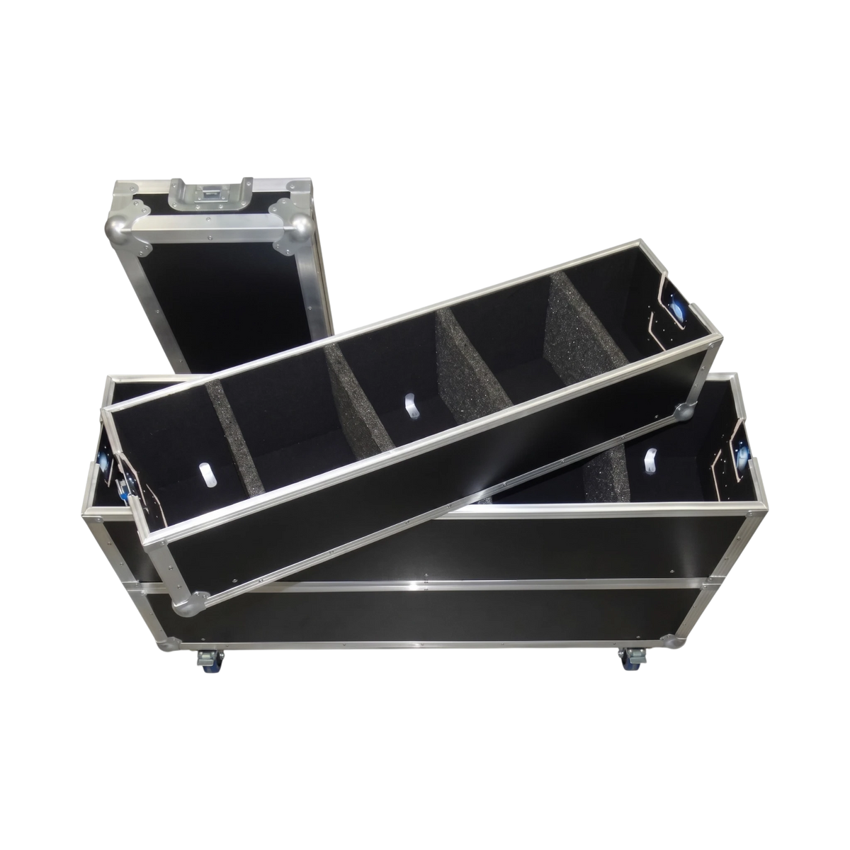 Black triple decker utility case, partially separated view showing lifted section, foam dividers, detached lid, and casters