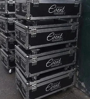 Stack of black event technical equipment cases with 'Event Pro Audio' branding.