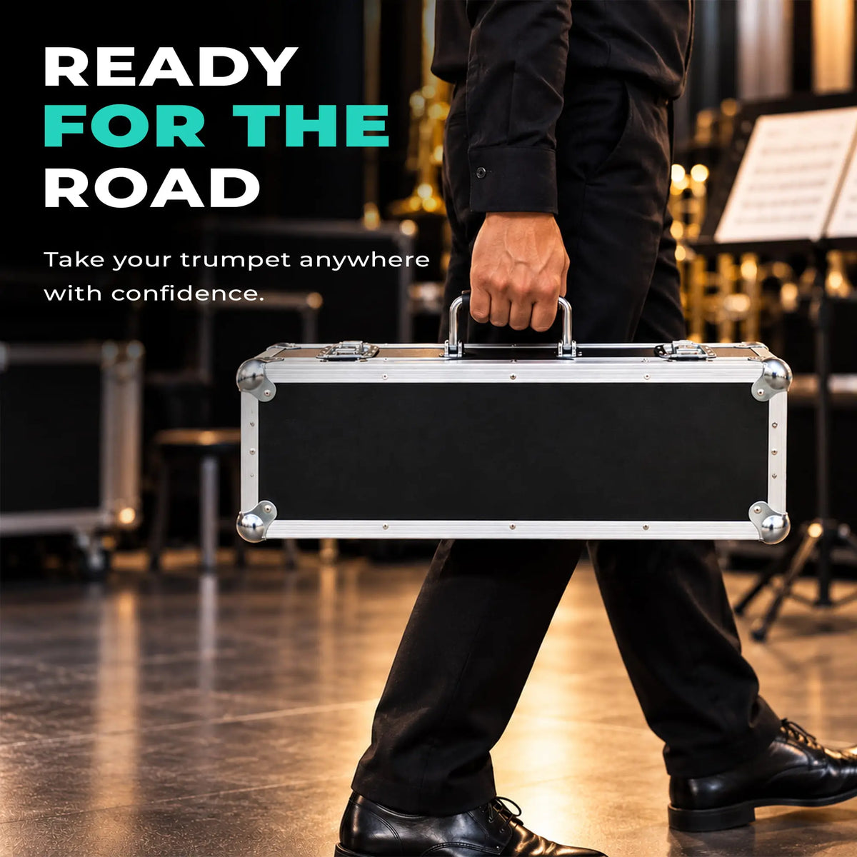 Gladstone trumpet ATA road case, lifestyle view carried by handle by a person in a music venue